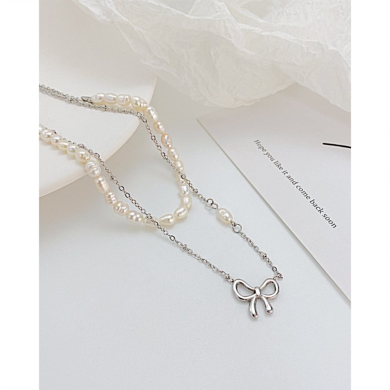 Hollow Bow Pearl Texture Naszyjnik Ze Stali Tytanowej Ins Niche Design Chain